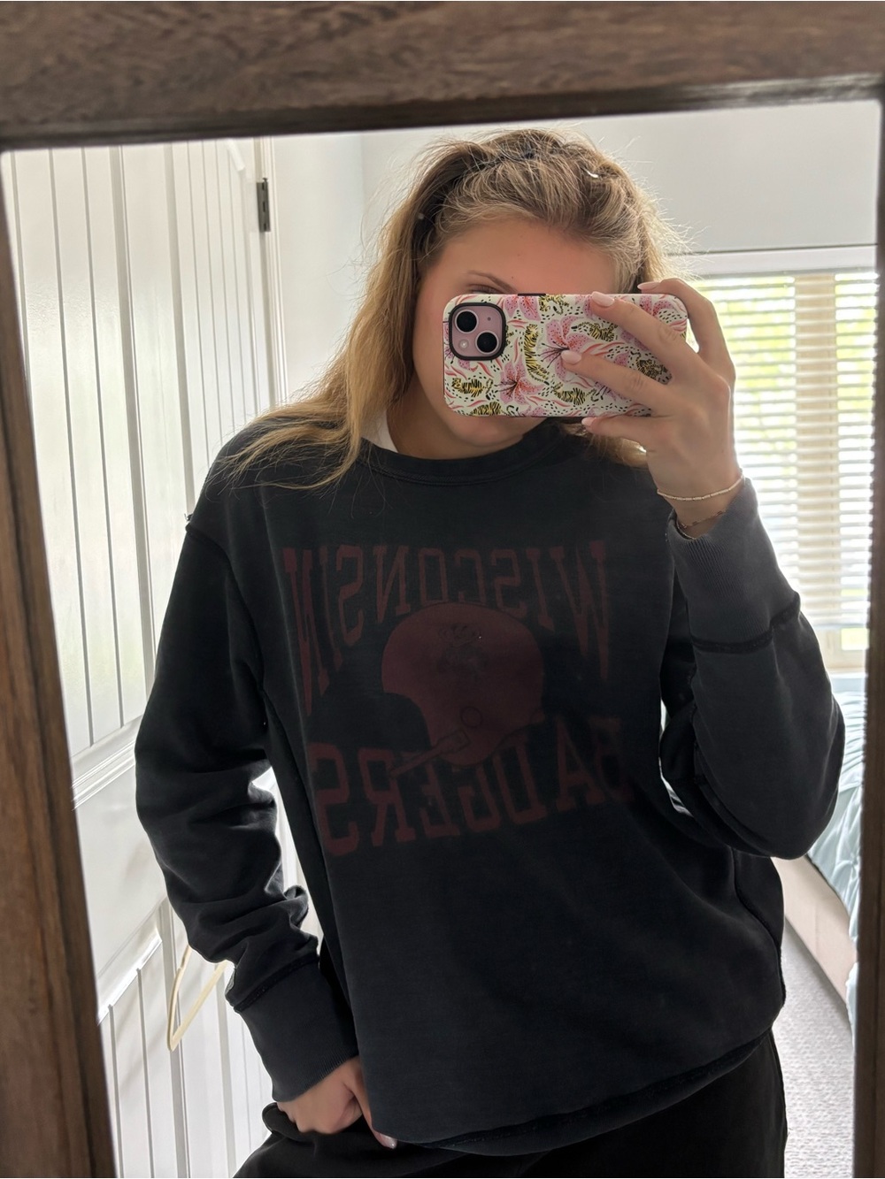 Vintage Black Wisconsin Badgers Graphic Sweatshirt with Faded Maroon Logo